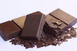 photo of chocolate rectangles with some chopped up
